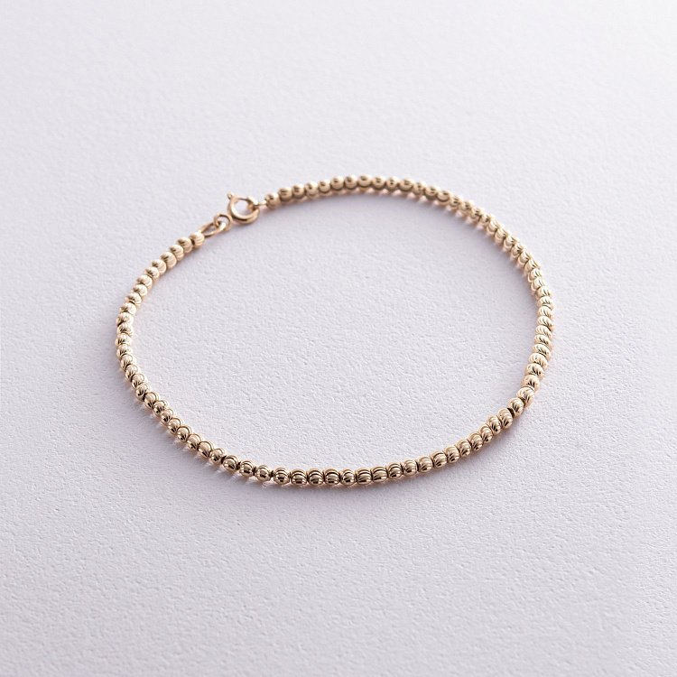 Браслет "Кульки" у жовтому золоті б05235 від ювелірного магазину Онікс