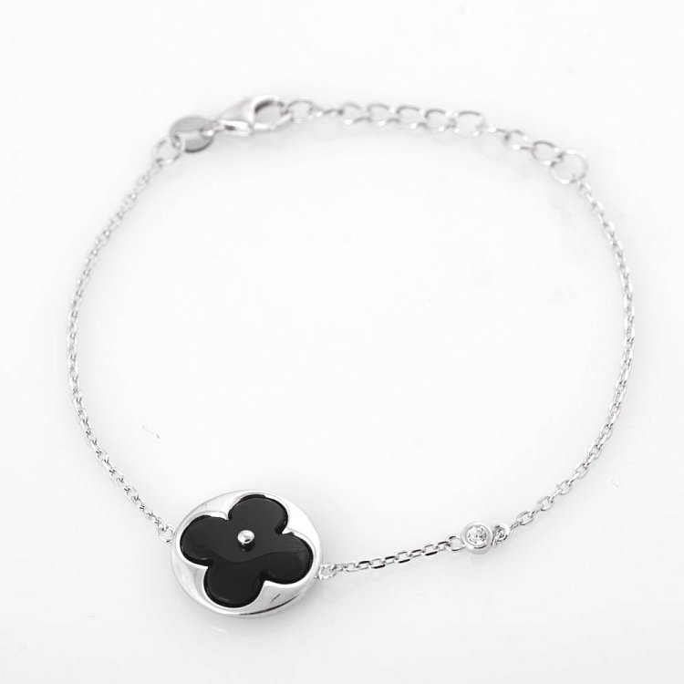 Браслет "Конюшина" з оніксом і фіанітом 141199 від ювелірного магазину Онікс