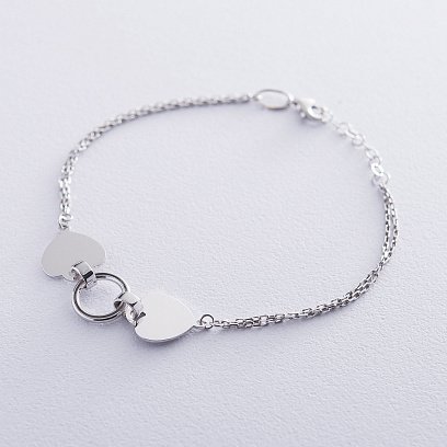 Подвійний золотий браслет "Два серця" б04312