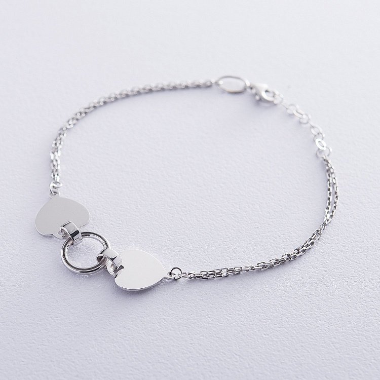 Подвійний золотий браслет "Два серця" б04312 від ювелірного магазину Онікс