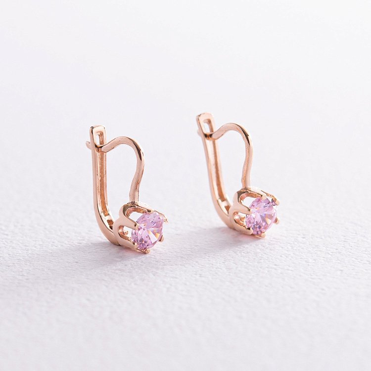 Дитячі золоті сережки з рожевими фіанітами с08127 від ювелірного магазину Онікс
