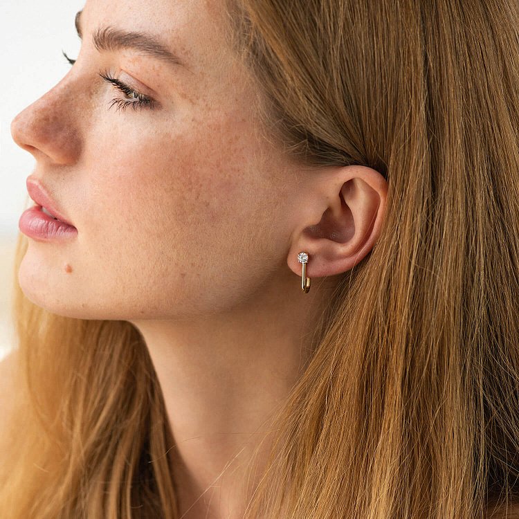 Сережки - пусети "Rita" з фіанітами (жовте золото) с09062 від ювелірного магазину Онікс - 1