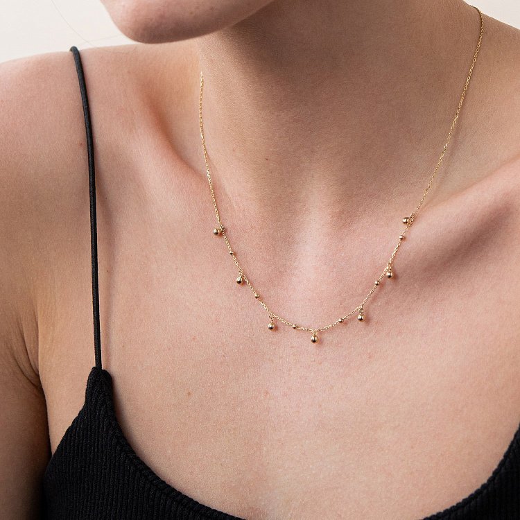 Колье "Шарики" в желтом золоте кол01949 от ювелирного магазина Оникс