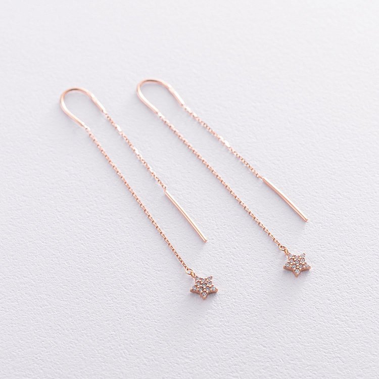 Золоті сережки - протяжки "Зірки" з фіанітами с05280 від ювелірного магазину Онікс
