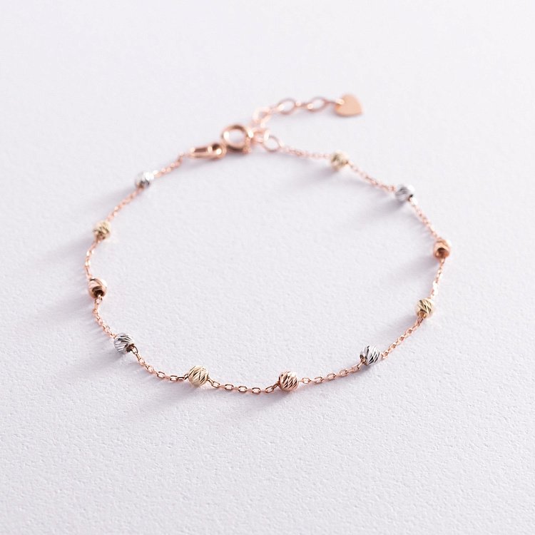 Золотий браслет "Кульки" б04372 від ювелірного магазину Онікс