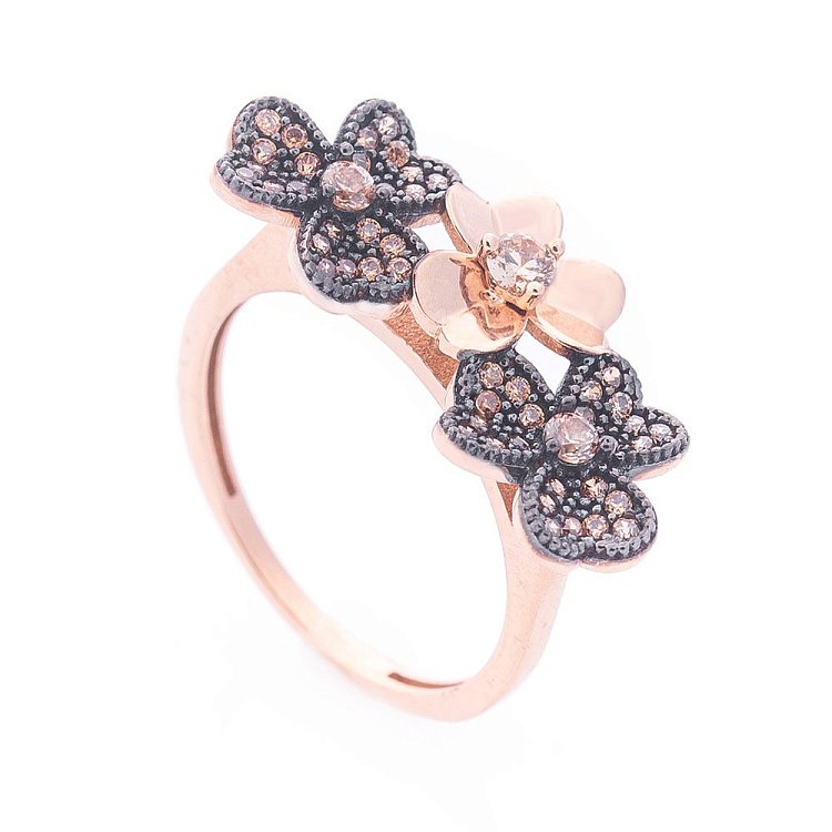 Золотий перстень з квіточками (фіаніт) к06220 Золотий перстень з квіточками (фіаніт) к06220 від ювелірного магазину Онікс