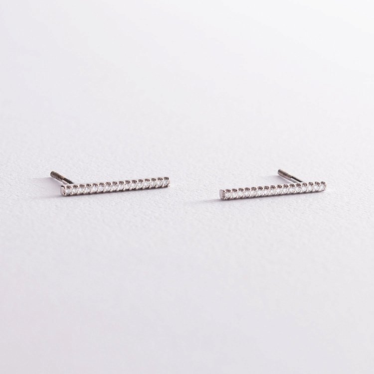 Золоті сережки - пусети "Джема" з діамантами 102-10083 від ювелірного магазину Онікс