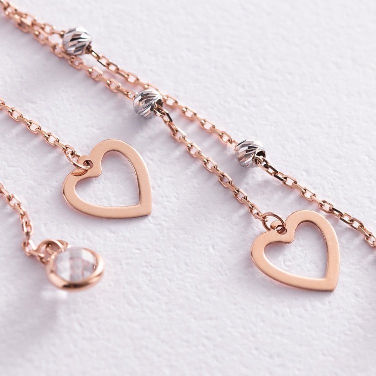 Золотые серьги "Сердечки" на цепочке (фианиты) с07227 от ювелирного магазина Оникс - 1