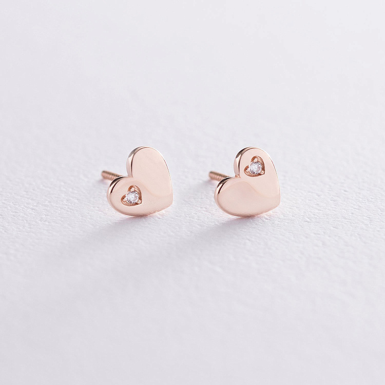 Золотые серьги "Сердечки" с фианитами с06071 от ювелирного магазина Оникс