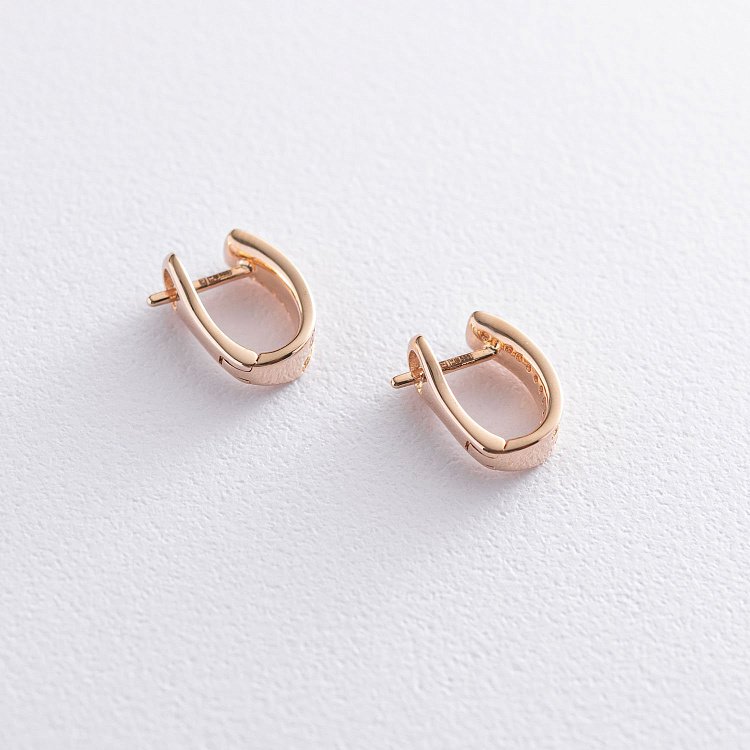 Золотые серьги "Love" с фианитами с07051 от ювелирного магазина Оникс - 2