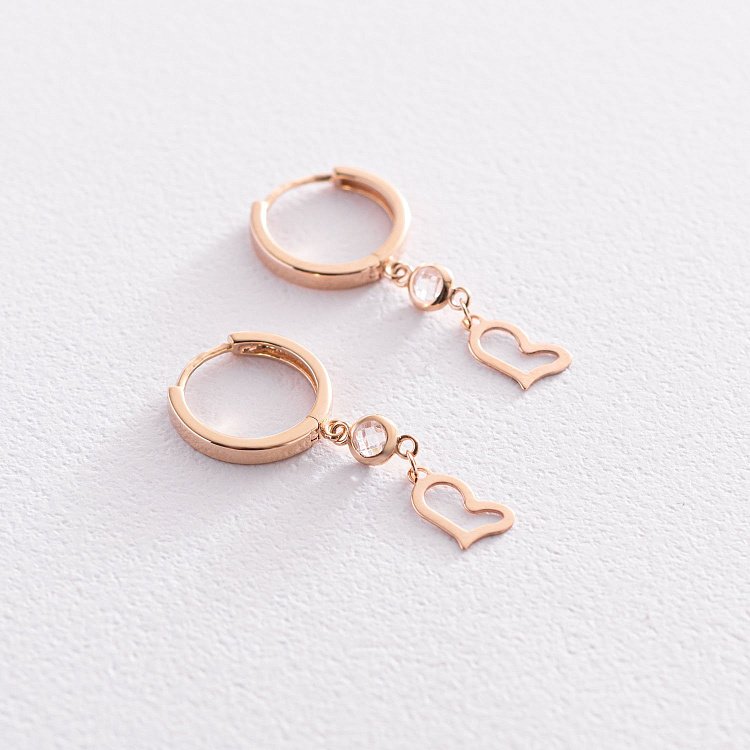 Золотые серьги "Сердечки" с фианитами с07427 от ювелирного магазина Оникс