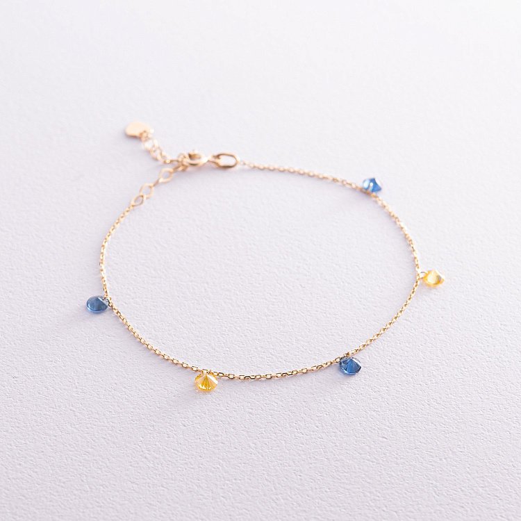 Золотий браслет "Українка" (сині та жовті фіаніти) б05116 від ювелірного магазину Онікс