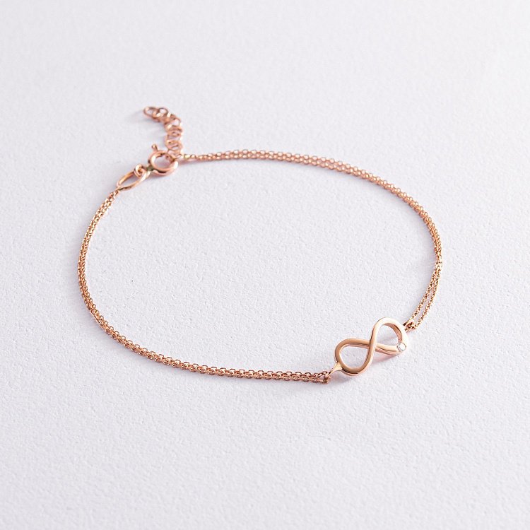 Золотий браслет "Нескінченність" з фіанітом б04859 від ювелірного магазину Онікс