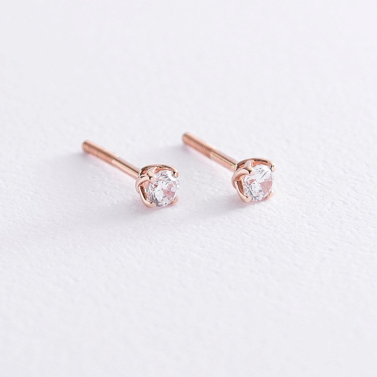 Золоті сережки - пусети з фіанітами с01568 від ювелірного магазину Онікс