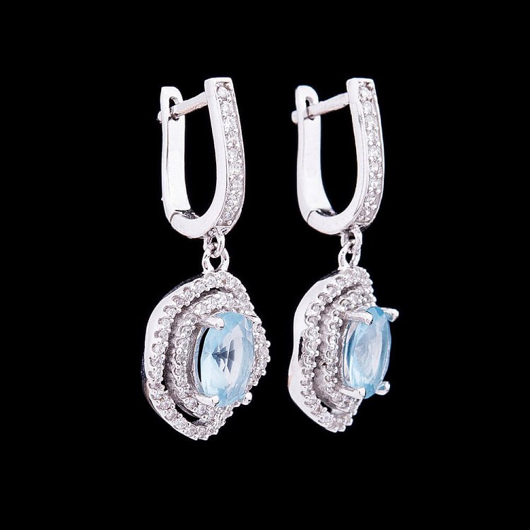 Сережки з синтетичної шпинелью блакитного кольору с03 від ювелірного магазину Онікс