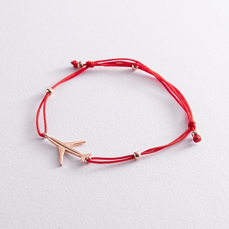 Браслет з червоною ниткою "Літачок" б05088 від ювелірного магазину Онікс