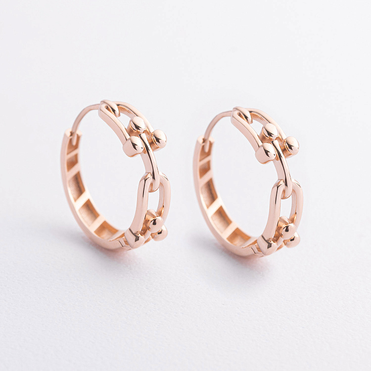 Сережки - кільця "Фантазія" в червоному золоті с09586 від ювелірного магазину Онікс