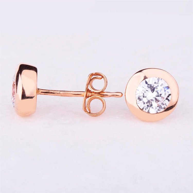 Золоті сережки-пусети з фіанітами с01090 від ювелірного магазину Онікс