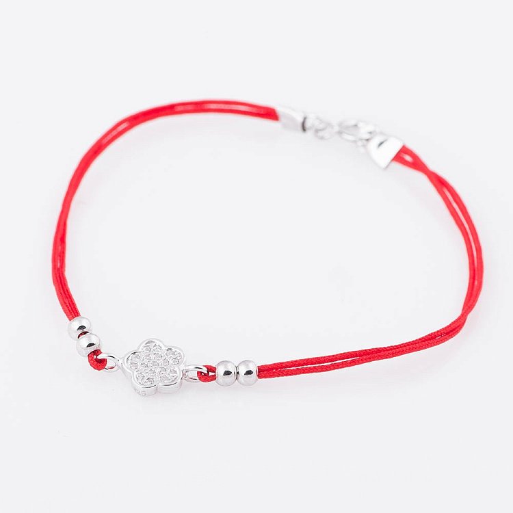 Браслет с красной нитью и цветочком 141159 от ювелирного магазина Оникс