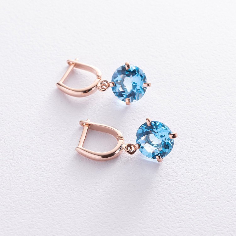﻿Золоті сережки "Захоплення" з блакитним топазом с05295 від ювелірного магазину Онікс - 12