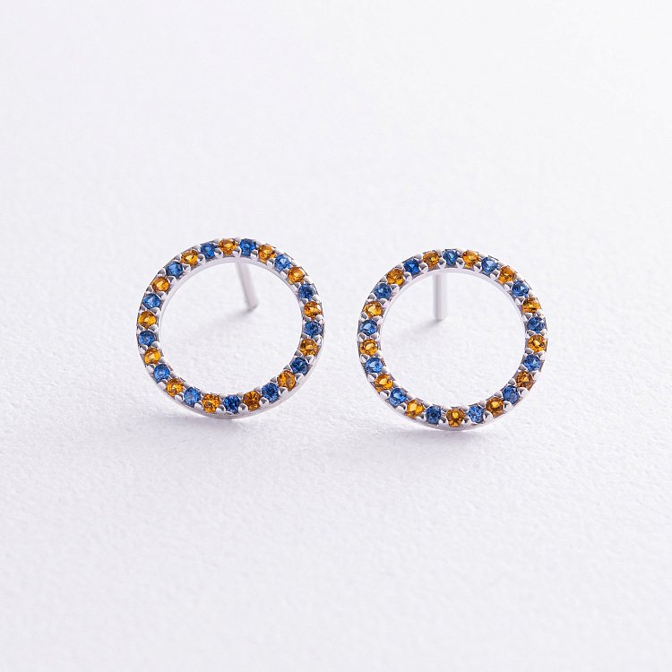 Срібні сережки - пусети з фіанітами 064590 від ювелірного магазину Онікс