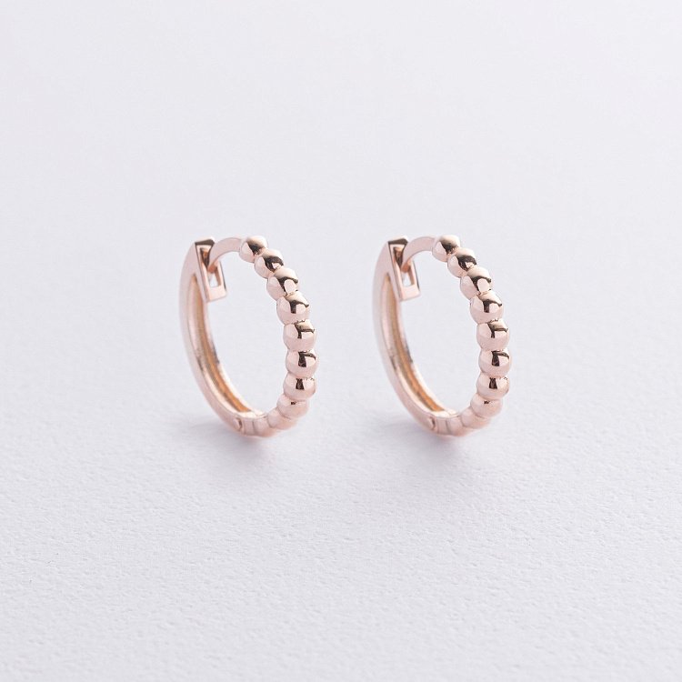 Сережки - кільця в червоному золоті (кульки) с09043 від ювелірного магазину Онікс