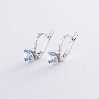 Золоті сережки з блакитним топазом с02407