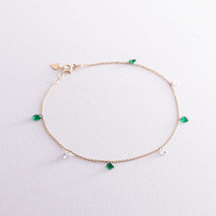 Браслет у жовтому золоті на ногу (зелені та білі фіаніти) б05137 від ювелірного магазину Онікс - 2