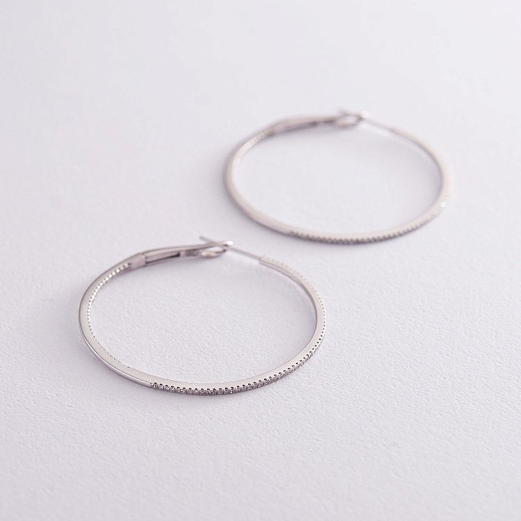 Золотые серьги - кольца с бриллиантами с490 от ювелирного магазина Оникс