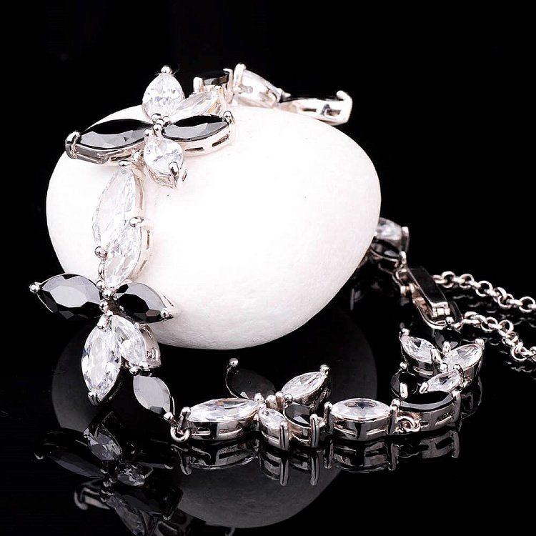 Срібний браслет з фіанітами "Квіточки" 14488 від ювелірного магазину Онікс - 1