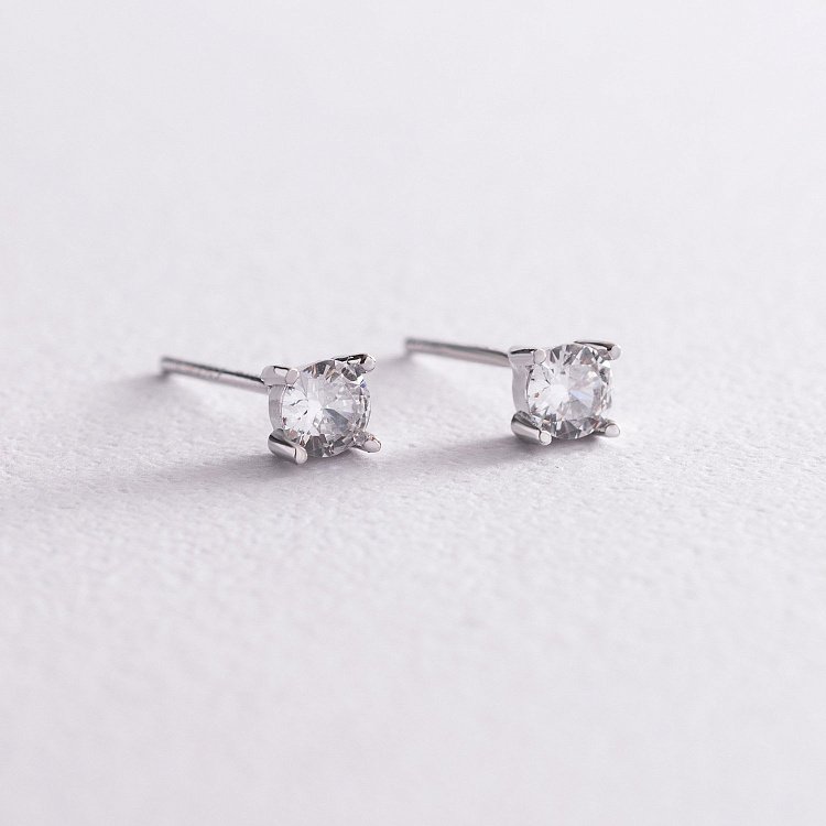 Срібні сережки - протяжки з фіанітами 123097 від ювелірного магазину Онікс - 2