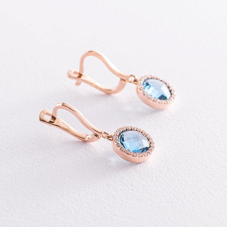 Золоті сережки з блакитними і білими фіанітами с07407 від ювелірного магазину Онікс - 3