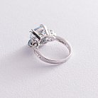 Серебряное кольцо с голубыми топазами и фианитами 111990 от ювелирного магазина Оникс - 2