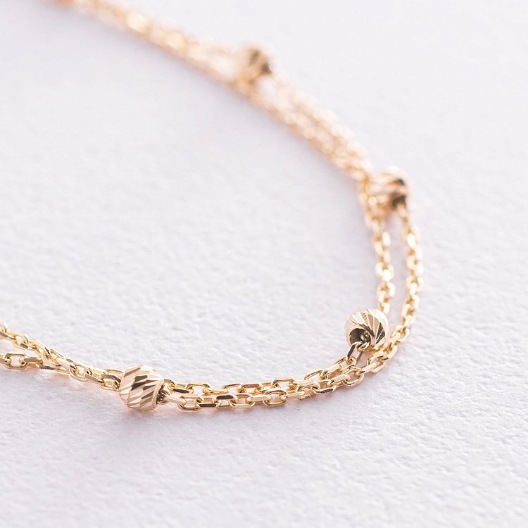 Двойной браслет "Шарики" в желтом золоте б04706 от ювелирного магазина Оникс - 3