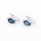 Срібні сережки з блакитним топазом і фіанітами 121396 от ювелирного магазина Оникс