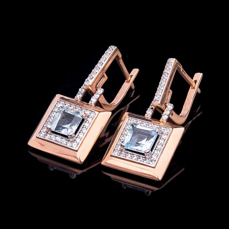 Золотые серьги с голубым топазом и фианитами с03164 от ювелирного магазина Оникс - 1