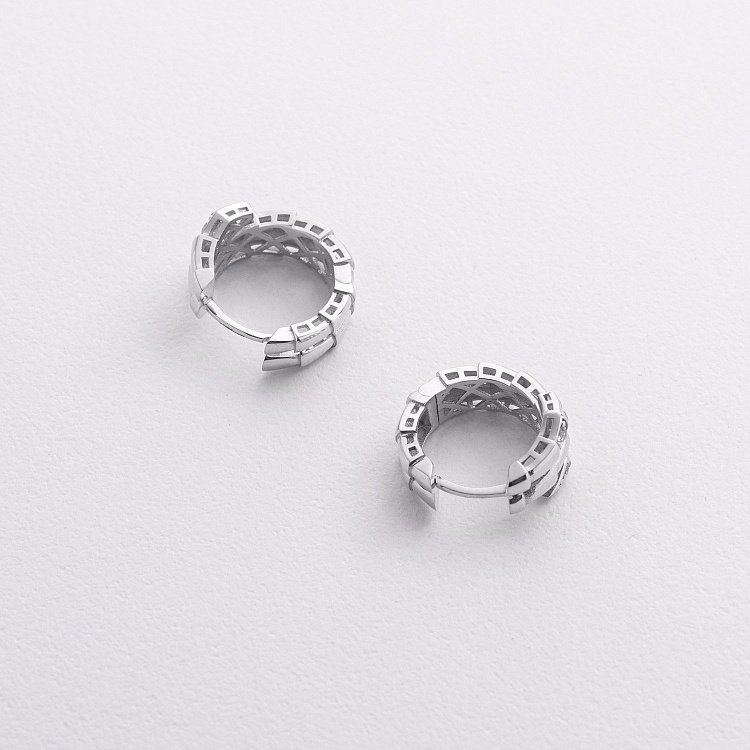 Сережки - кільця "Змії" у білому золоті (фіаніти) с09337 від ювелірного магазину Онікс - 1