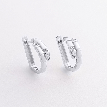 Сережки "Змії" у білому золоті (фіаніти) с09469