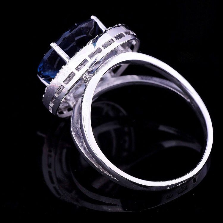 Золота каблучка з блакитним "Лондон" топазом і фіанітами к416 від ювелірного магазину Онікс - 2