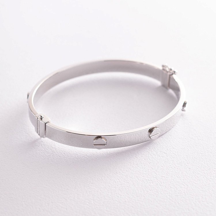 Жорсткий браслет в білому золоті (0.6 см) б03598 від ювелірного магазину Онікс