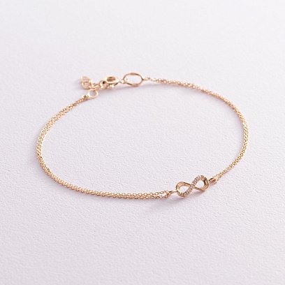 Браслет "Нескінченність" в жовтому золоті (фіаніти) б04861