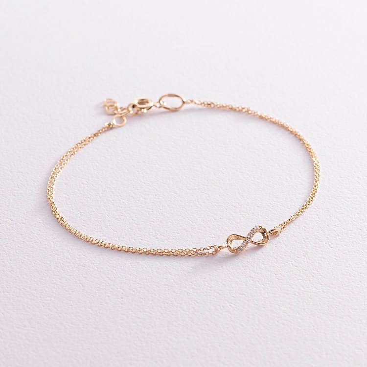 Браслет "Нескінченність" в жовтому золоті (фіаніти) б04861 від ювелірного магазину Онікс