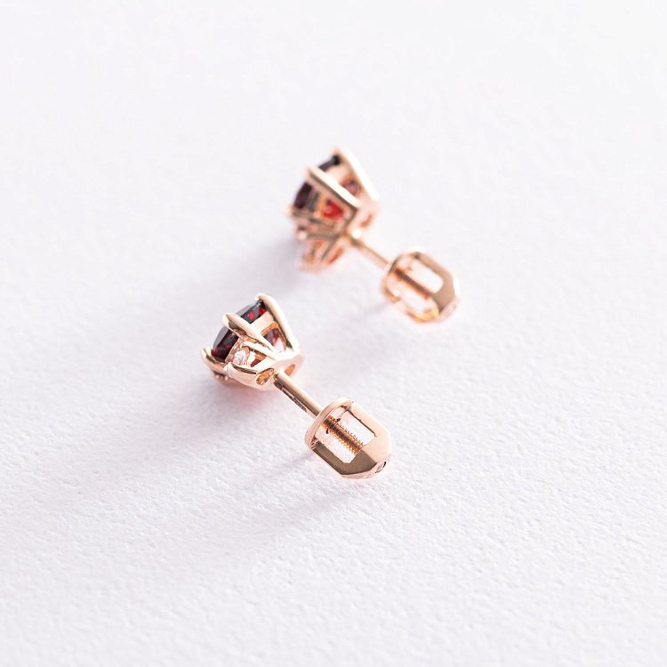 ﻿Золоті сережки-пусети з піропом і фіанітами с05042 від ювелірного магазину Онікс - 2