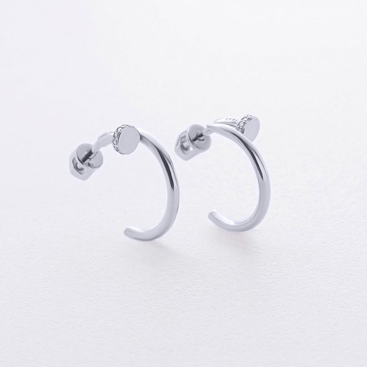 Сережки - пусети "Цвях" у білому золоті (фіаніти) с09173 від ювелірного магазину Онікс