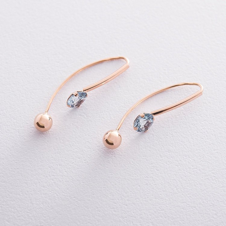 Золоті сережки "Натхнення" з фіанітами с06709 від ювелірного магазину Онікс