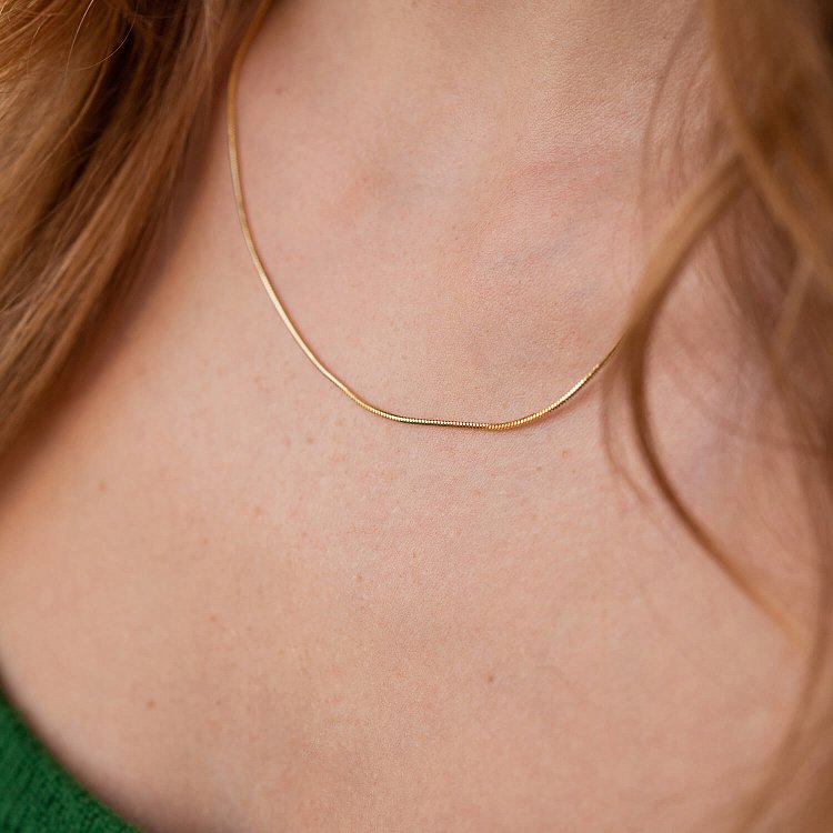 Золотий ланцюжок, плетіння Снейк (1.5 мм) ц00211-1.5 від ювелірного магазину Онікс - 6