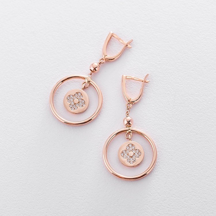 Золотые серьги "Клевер" с фианитами с06365 от ювелирного магазина Оникс