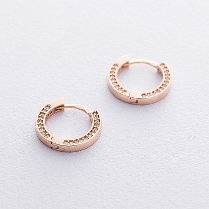 Золоті сережки - кільця з фіанітами с06550