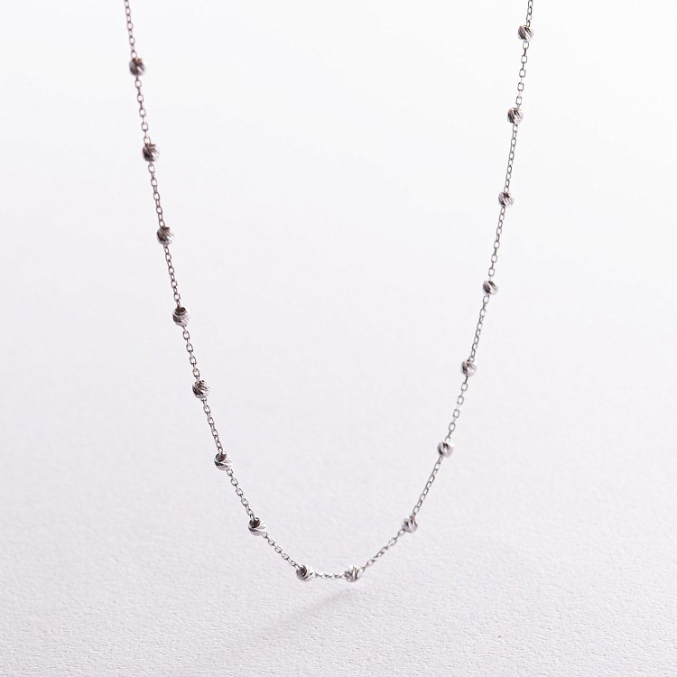 Кольє "Кульки" у білому золоті кол02409 від ювелірного магазину Онікс