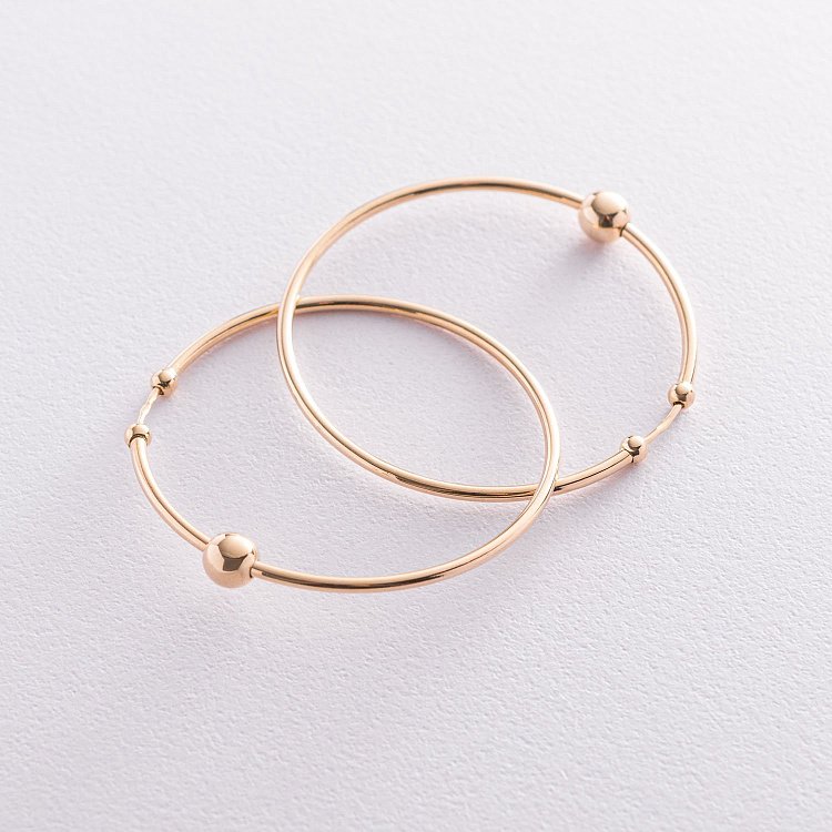 Сережки - кільця "Гармонія" в жовтому золоті с07326 від ювелірного магазину Онікс - 2